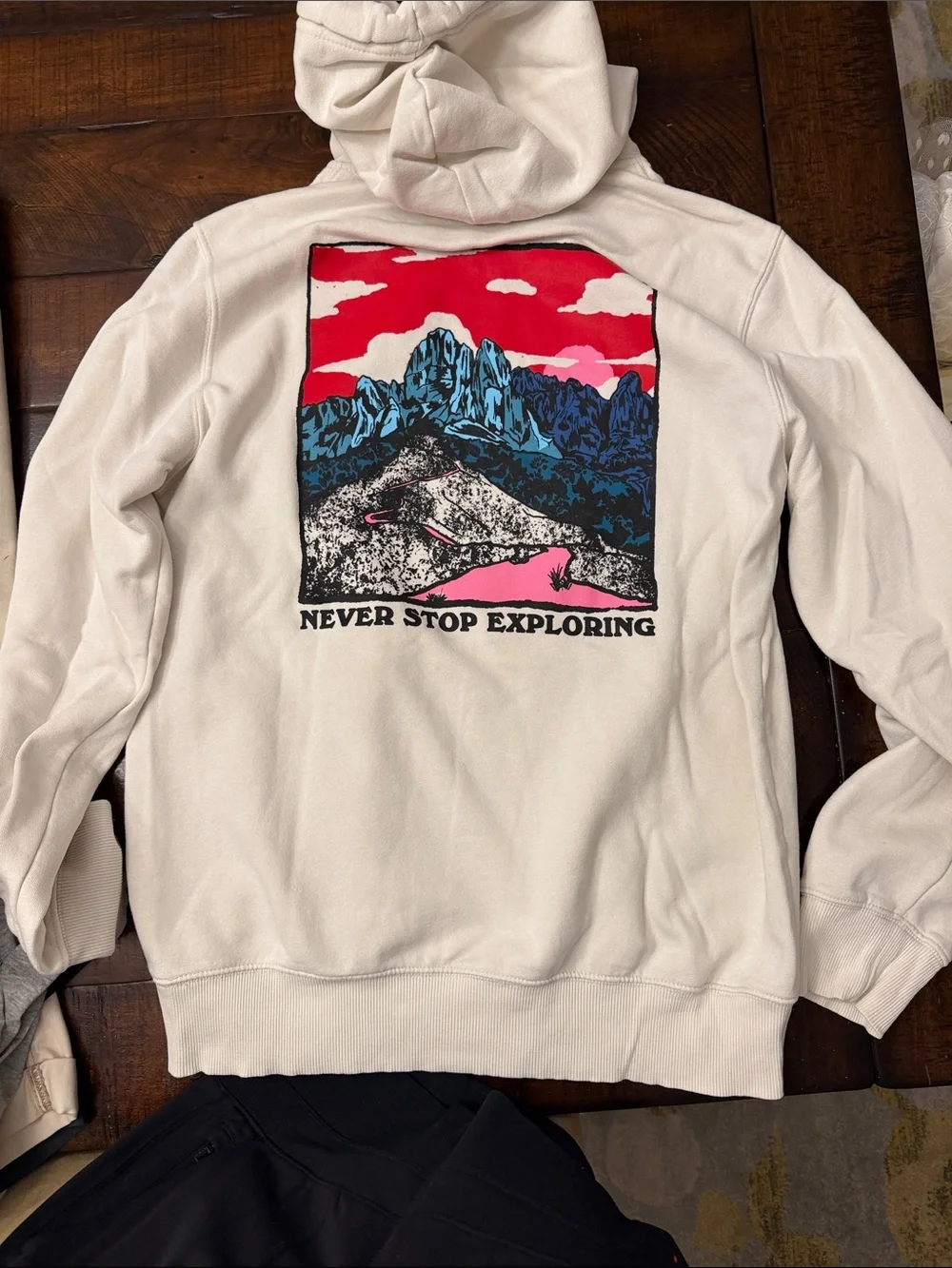 The North Face Men's Cream Hoodie with Blue Logo